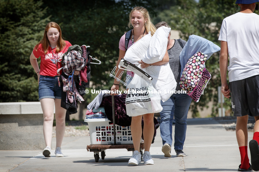 Samantha Simoneau from Burrton, Kansas, moves into Smith Hall Sunday afternoon. Housing move in for sorority rush week. August 12, 2018. Photo by Craig Chandler / University Communication.