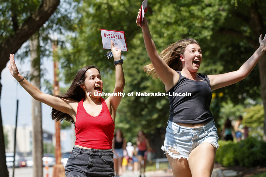 New pledges celebrate as they head to their sorority houses Saturday afternoon. Bid Day for Greek Sororities. August 18, 2018. Photo by Craig Chandler / University Communication.