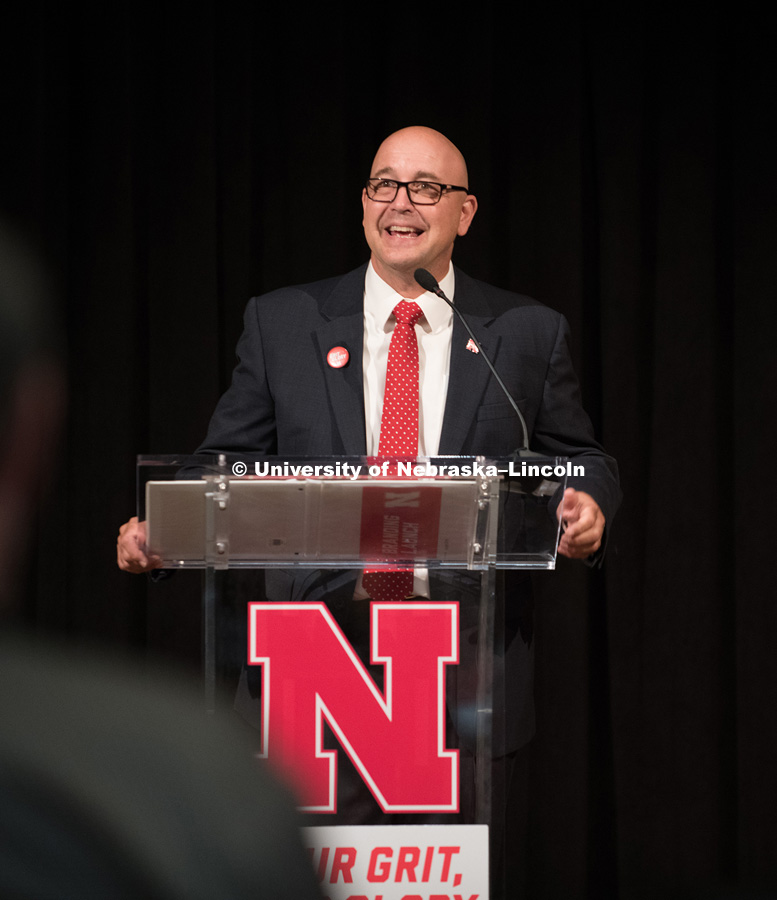 Michael Boehm talks to faculty and staff before the big reveal to the students. In Our Grit, Our Glory brand reveal party on east campus at the Nebraska Union. August 31, 2018. Photo by Greg Nathan, University Communication.
