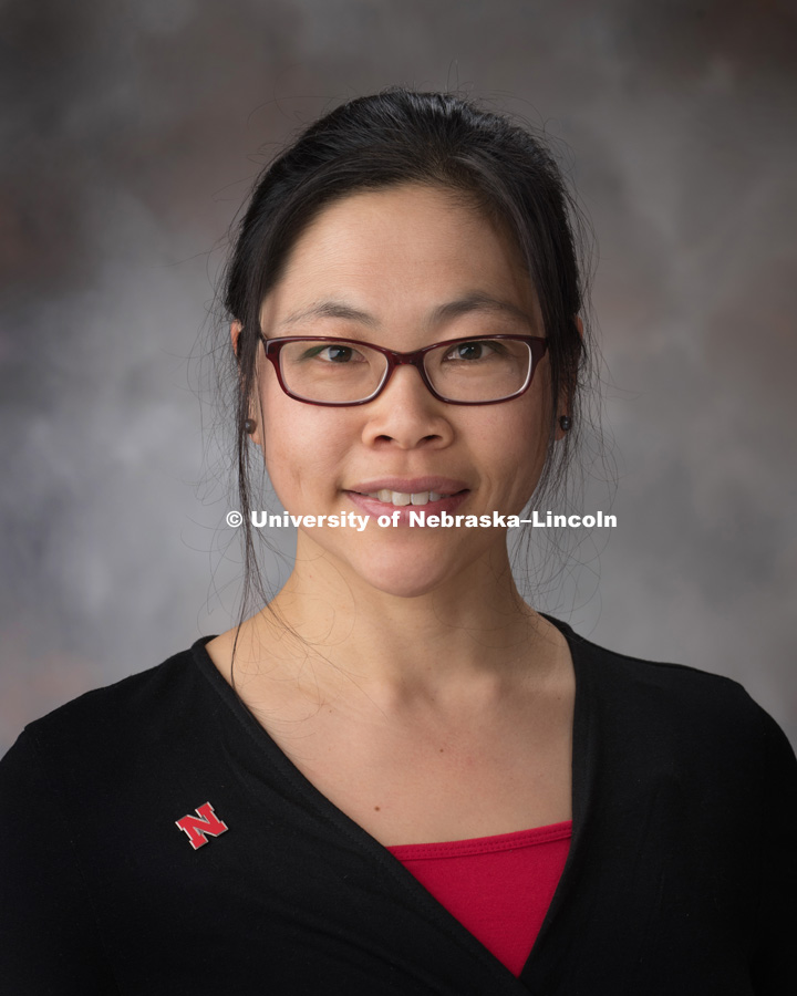 Studio portrait of Yvonne Lai (Yuan Jiang ), Assistant Professor of Mathematics. November 2, 2018, Photo by Gregory Nathan, University Communication.