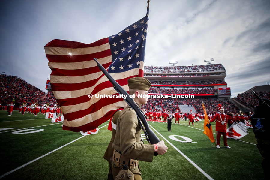 Navy ROTC cadet MIDN 3/C Jakob Moberg wears actual World War 1 uniforms to honor the 100th anniversary of Amistice Day. The color guard also carried a 48-star flag.   Nebraska vs. Illinois football in Memorial Stadium. November 10, 2018. Photo by Craig Chandler / University Communication.