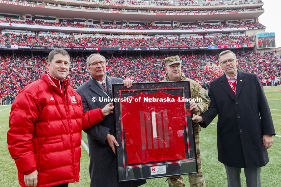 NU President Hank Bounds, Athletic Director Bill Moos, USSTRATCOM’s Assistant to the Commander, Major General Richard Evans and Chancellor Ronnie Green during a NSRI presentation at the end of the first quarter. Nebraska vs. Illinois football in Memorial Stadium. November 10, 2018. Photo by Craig Chandler / University Communication.