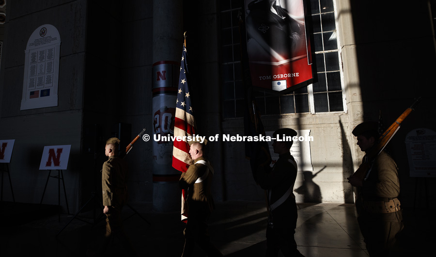 ROTC Navy Color Guard brings the colors into the ceremony. ROTC Color Guard members wore actual World War 1 uniforms for the ceremony. A new display commemorating the World War I service of Nebraskans and University of Nebraska students was dedicated during a November 11 ceremony at Memorial Stadium. November 11, 2018. Photo by Craig Chandler / University Communication.