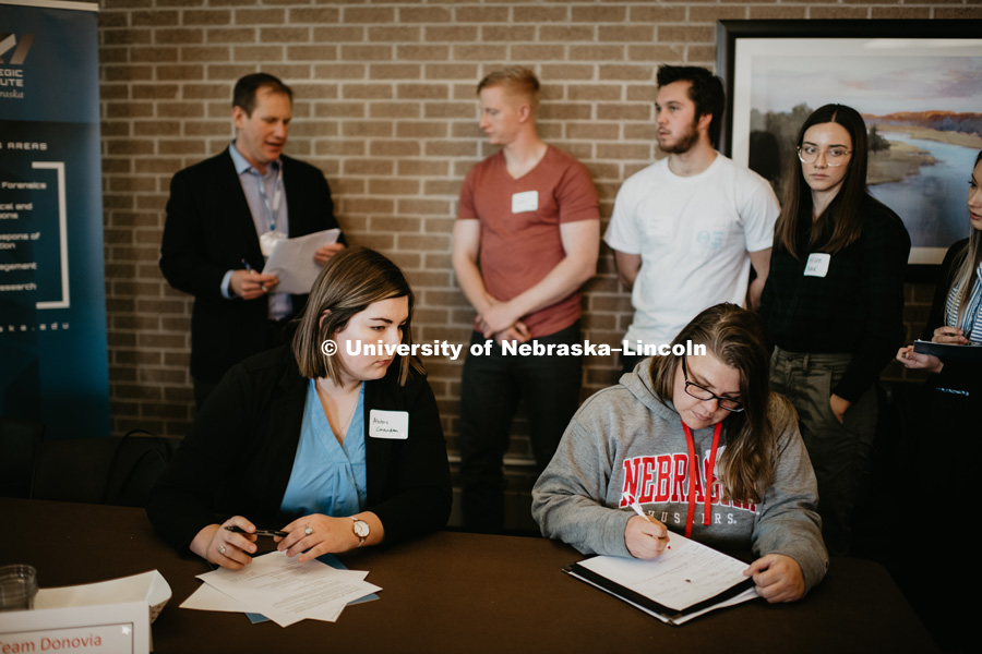 Dr. Tyler White (Political Science), has developed a "war game" for about 40 UNL students focused on risk mitigation and conflict escalation in a world where both cyber and nuclear threats are a growing issue. November 16, 2018. Photo by Justin Mohling, University Communication.