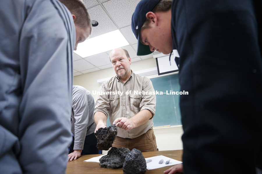 David Harwood teaches GEOL 125 - Frontiers in Antarctic Geosciences. Students are classifying rocks and will then add them to their geologic timelines. December 3, 2018. Photo by Craig Chandler / University Communication.