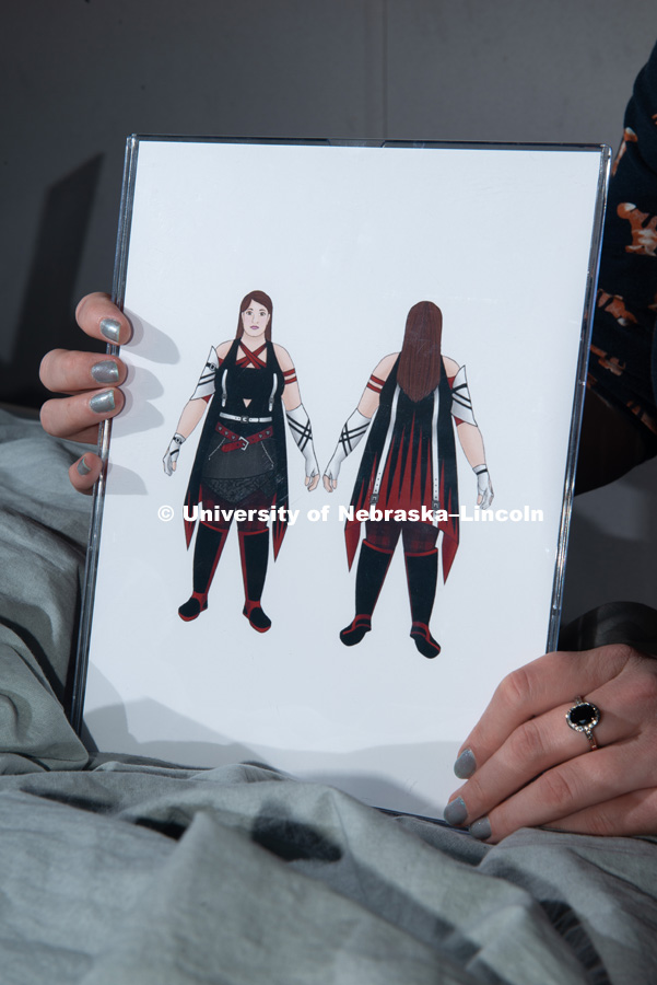 Grad student, Stephanie Pitcher is pictured with avatars from her thesis project, inspired by games such as "Assassin's Creed" and "Final Fantasy." She designed clothing for her avatars to show “real” body types with practical outfits. December 13, 2018. Photo by Greg Nathan, University Communication.