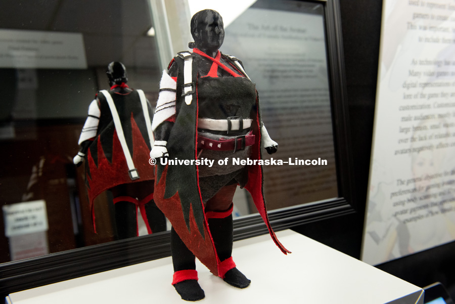 Grad student, Stephanie Pitcher is pictured with avatars from her thesis project, inspired by games such as "Assassin's Creed" and "Final Fantasy." She designed clothing for her avatars to show “real” body types with practical outfits. December 13, 2018. Photo by Greg Nathan, University Communication.