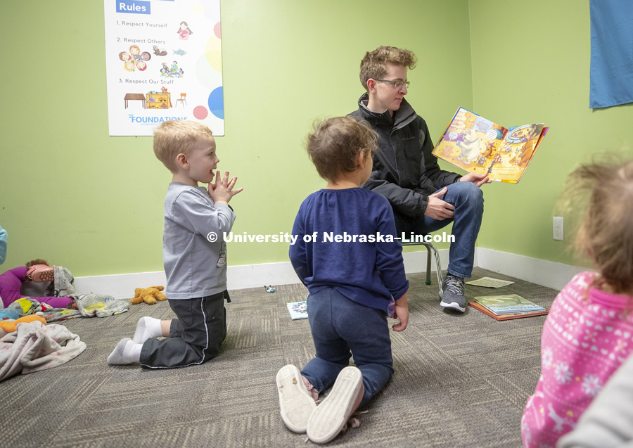 Thomas Kerr, freshman in accounting from Hastings, reads to children Monday morning at the Foundations Progressive Learning Center. Husker Reading Challenge. Students, faculty and staff are invited to honor King’s legacy through a day of service. In collaboration with Prosper Lincoln and Read Aloud Lincoln, the Center for Civic Engagement at Nebraska will host the reading challenge. January 21, 2019. Photo by Craig Chandler / University Communication.