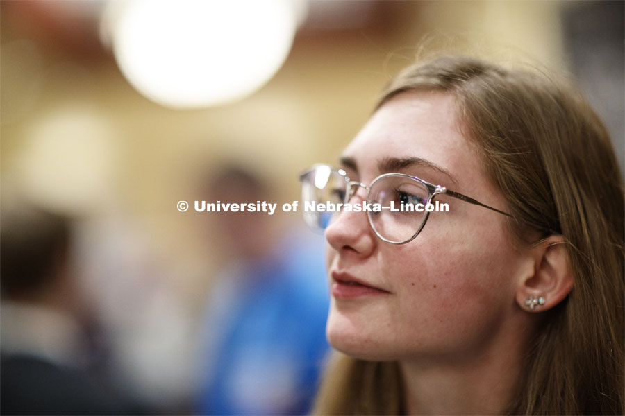 Carly Thody, a junior in environmental studies, look over the possibilities during day two of the Career Fair at Embassey Suites with emphasis on Science, Technology, Engineering and Mathematics. February 13, 2019.  Photo by Craig Chandler/University Communication.