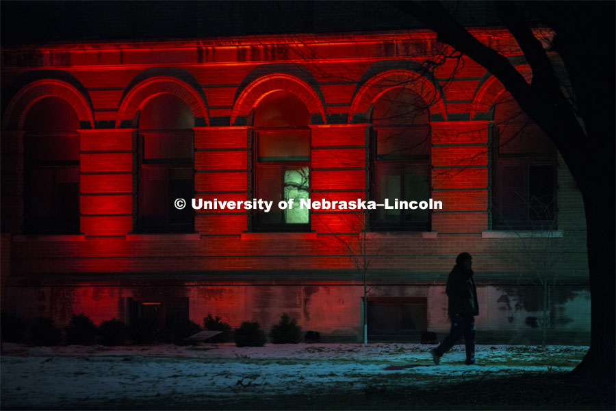Entomology Hall lit up red during Glow Big Red. Glow Big Red bathes the campuses with red lights as part of N150's Charter Week celebration. February 14, 2019. Photo by James Wooldridge for University Communication.
