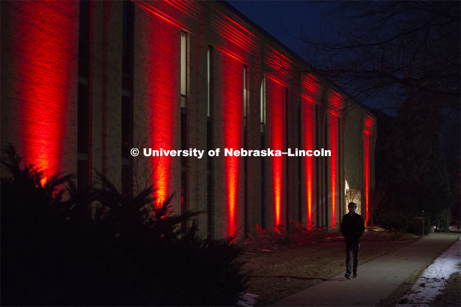 The Home Economics building lit up red during Glow Big Red. Glow Big Red bathes the campuses with red lights as part of N150's Charter Week celebration. February 14, 2019. Photo by James Wooldridge for University Communication.