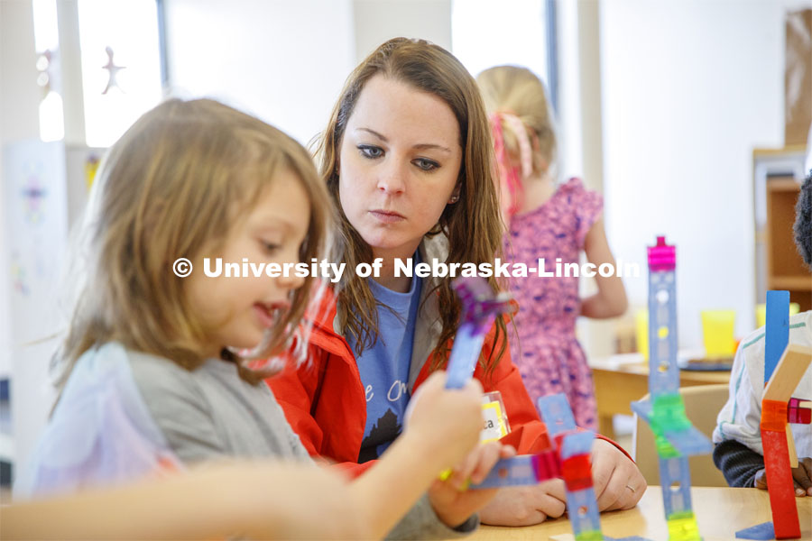 Monica Meyer, senior in Inclusvie Child Youth and Family Studies, works with children at the Malone Center. Ruth Staples Child Development Lab student teachers and children work with children at the Malone Center. Febrary 28, 2019. Photo by Craig Chandler / University Communication