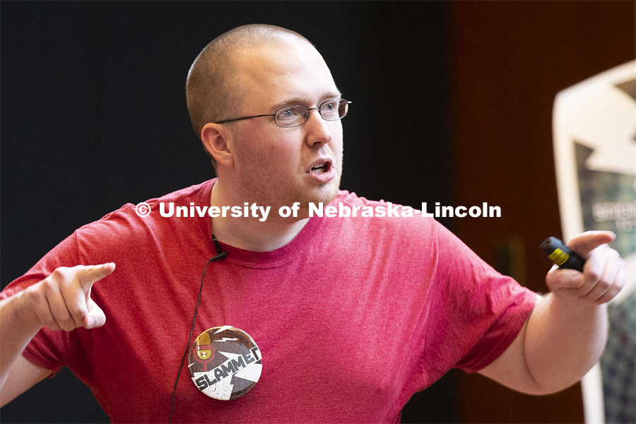 Andrew Conner, graduate student in mathematics, discusses his passion of his math genre even when others don't understand. Nebraska’s fourth annual Science Slam held at Wick Alumni Center. April 9 2019. Photo by Craig Chandler / University Communication.