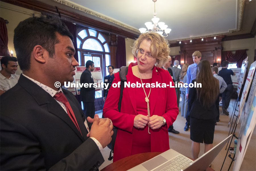 Senator Sue Crawford of the District 45 at the poster session. This year's research day at the capitol was held at the neighboring Ferguson House. State Senators Research Fair at the Ferguson House. April 16, 2019. Photo by Craig Chandler / University Communication.