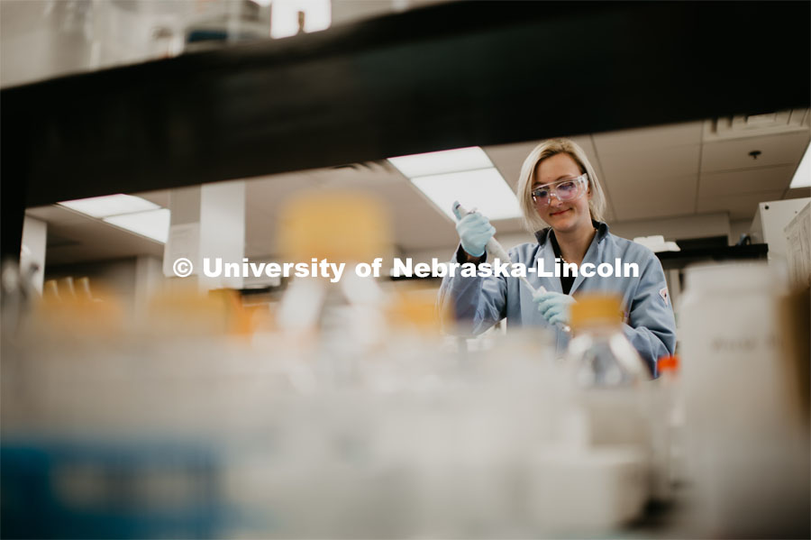 Graduate student working in a lab. April 23, 2019. Photo by Justin Mohling / University Communication.