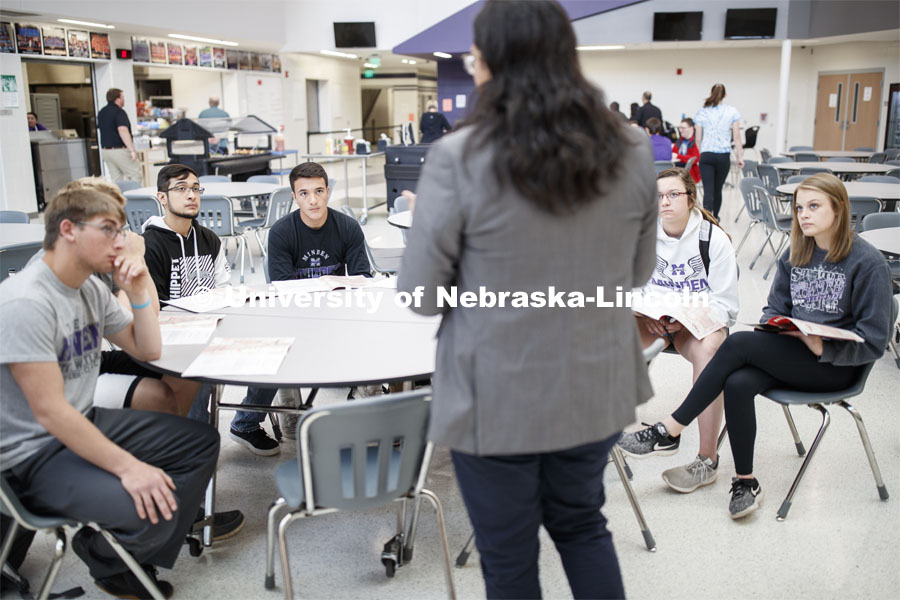 Abel Covarrubias, one of three dedicated western Nebraska recruiters, talks with interested juniors at Minden, NE, High School. April 23, 2019. Photo by Craig Chandler / University Communication.