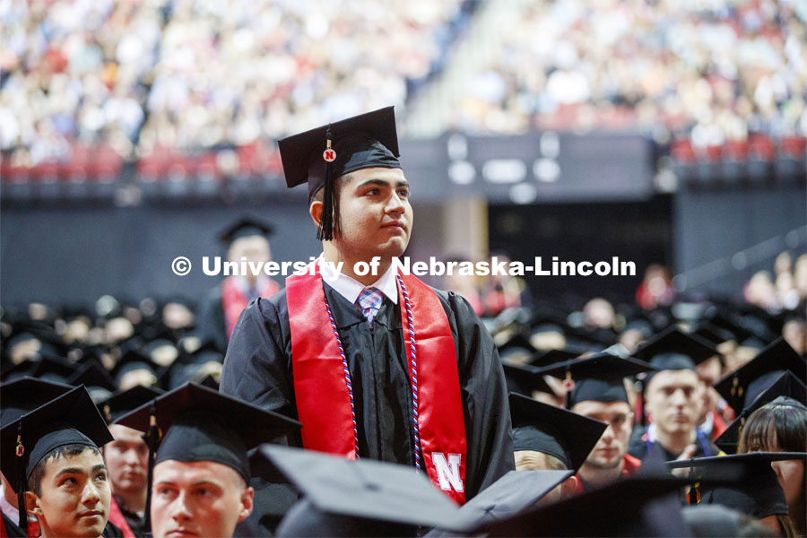 Juan Dominguez stands along with the other ROTC members of the graduating class. Undergraduate commencement at Pinnacle Bank Arena, May 4, 2019.  Photo by Craig Chandler / University Communication.