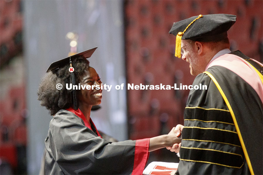 Aguel Lual receives her Fine and Performing Arts degree. Undergraduate commencement at Pinnacle Bank Arena, May 4, 2019. Photo by Craig Chandler / University Communication.