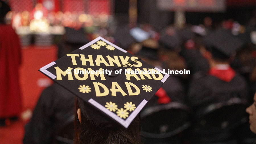 Decorated mortarboard. Undergraduate commencement at Pinnacle Bank Arena, May 4, 2019. Photo by Craig Chandler / University Communication.