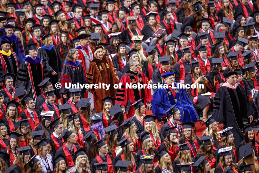 The platform party processes to the stage. Undergraduate commencement at Pinnacle Bank Arena, May 4, 2019. Photo by Craig Chandler / University Communication.