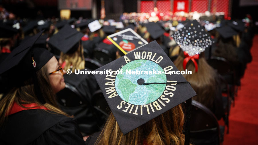 Paige Tiedeman's mortar board exclaims her next steps. Undergraduate commencement at Pinnacle Bank Arena, May 4, 2019. Photo by Craig Chandler / University Communication.