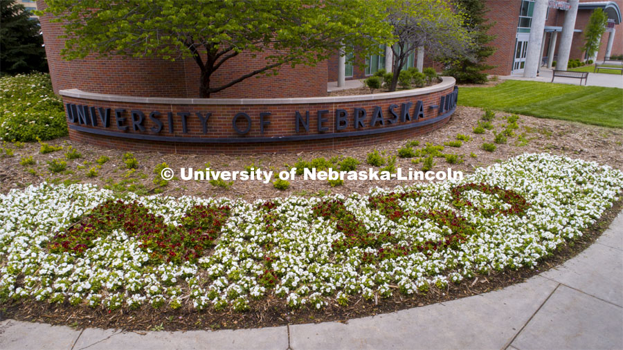 Flowers outside the Visitors Center spell out N150 as part of our anniversary celebration. May 30, 2019. Photo by Craig Chandler / University Communication.