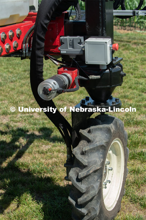 Santosh Pitla, associate professor of advanced machinery systems in the Department of Biological Systems Engineering at the University of Nebraska–Lincoln, is currently developing an autonomous tractor using ground robotics. Pitla and his team are testing their driverless tractor at the Agricultural Research and Development Center (ARDC, MEAD). The autonomous tractors are named Flexible Structured Robotic Vehicle (FlexRo), the tractor is currently used for plant phenotyping, which is measuring the physical characteristics of the plant. According to Pitla, cameras are added to the machine to collect images that characterize plant conditions. Photo for the 2019 publication of the Strategic Discussions for Nebraska magazine. July 17, 2019, Photo by Gregory Nathan / University Communication. 


