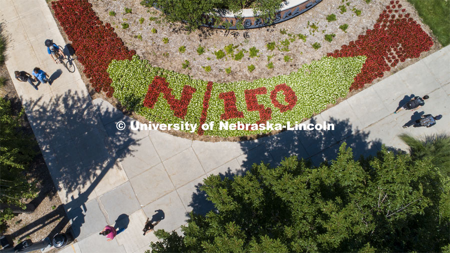 Flowers outside the Visitors Center spell out N150 as part of our anniversary celebration. August 6, 2019. Photo by Craig Chandler / University Communication.