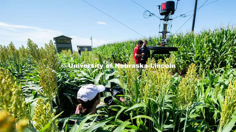 Frank Bai is interviewed by Dave Lee, Producer/Video Journalist from BBC News

San Francisco. Frank the main instrumentation person on the project, which uses a suspended camera, spidercam, to learn about characteristics of crops. Eastern Nebraska Research and Extension Center, 1071 Co Rd G, Ithaca, NE. July 14, 2019. Photo by Gregory Nathan / University Communication.

