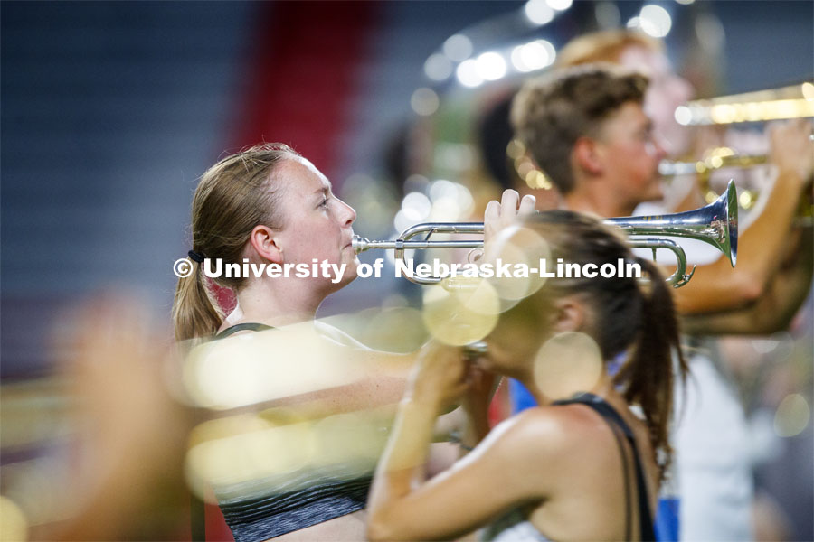 Jenna McCoy and the Cornhusker Marching Band goes through their pregame routing during Tuesday evening practice in Memorial Stadium. August 20, 2019. Photo by Craig Chandler / University Communication.