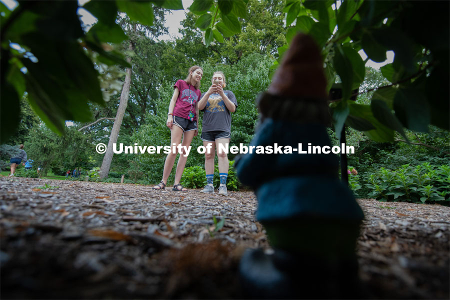 East campus residents from Massengale Hall play “Find The Gnome”, meeting others and building new relationships. July 22, 2019. Photo by Gregory Nathan / University Communication.