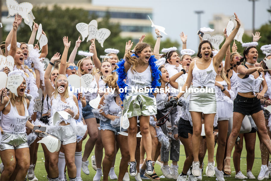 Pi Beta Phi members make some noise on the intramural fields while waiting for the bids to be opened. Sorority Bid Day. August 24, 2019. Photo by Craig Chandler / University Communication.