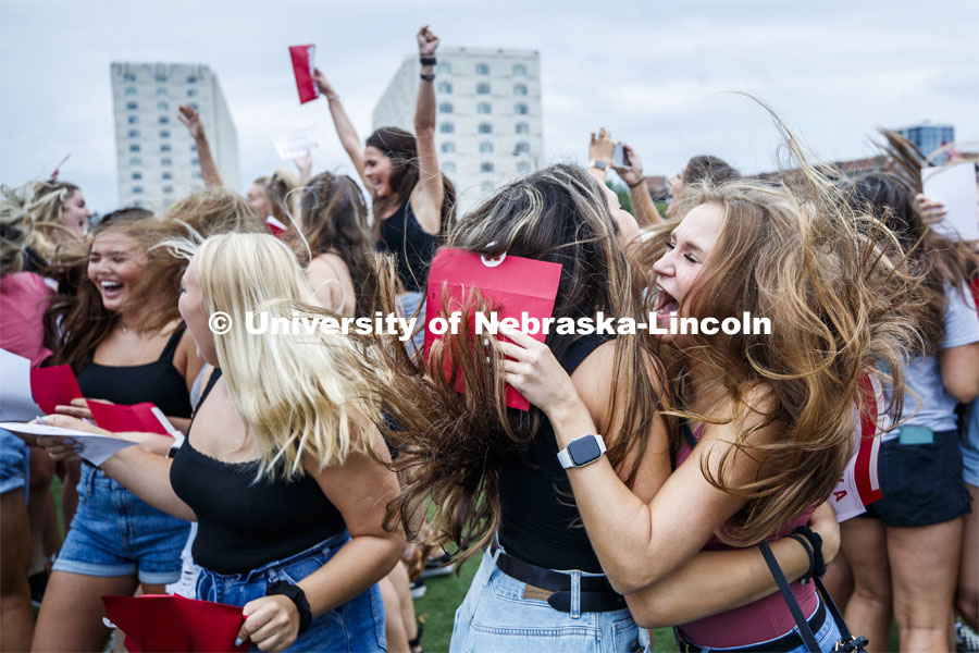 Lauryn Johnson and Allyse Kleiber celebrate after opening their bids. New sorority members celebrate their bids as they open their invitations on the intramural fields. Sorority Bid Day. August 24, 2019. Photo by Craig Chandler / University Communication.