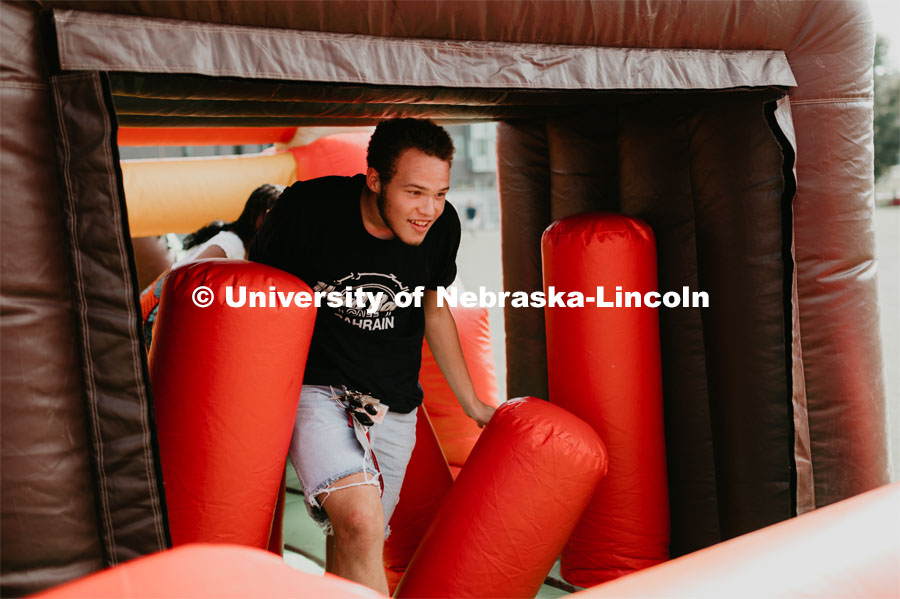 Engineering students, faculty and staff attended the College of Engineering’s Big Red Welcome event, Rock The Block. They were able to meet with Engineering Student Organizations, all while having fun learning about the great on-campus resources to support well-being, community and engagement. Students were able to play in the inflateables. August 29, 2019. Photo by Justin Mohling / University Communication.
