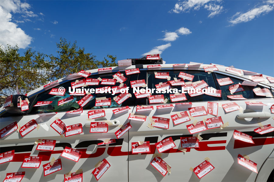 Huskers pledged to speak out and stand up against sexual and relationship violence in the first of a three-day "Cover the Cruiser" initiative. The project encourages students, faculty and staff to sign a “Use Your Voice” pledge card and attach it to a police car. Each card signifies a commitment to help others and speak out against all forms of sexual violence. September 12, 2019. Photo by Craig Chandler / University Communication.