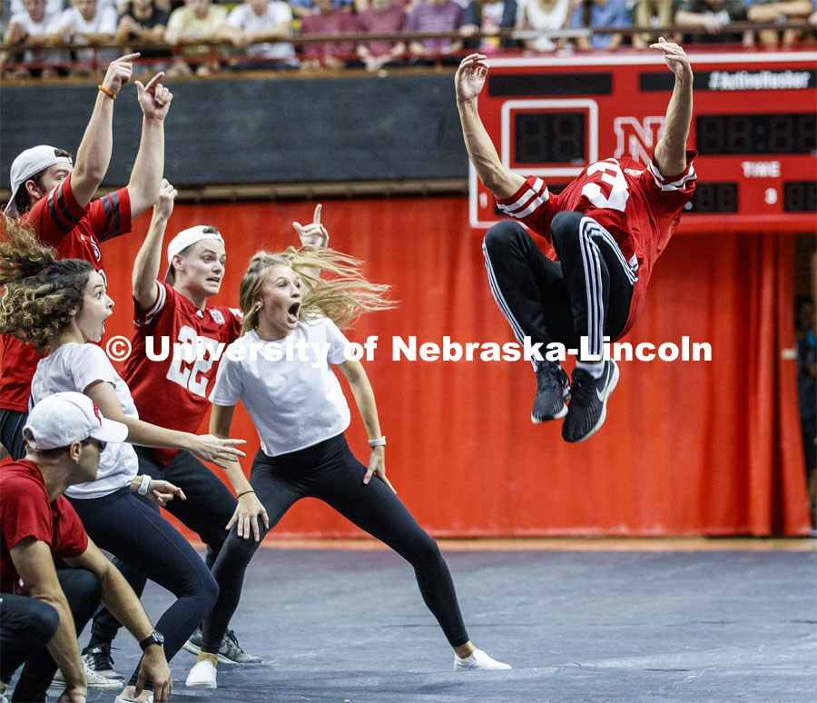 Triad 2--Phi Delta Theta, Phi Mu, Pi Kappa Phi, Pi Alpha Chi, Triangle, Chi Phi--performers react to a teammate's flip. Showtime at the Coliseum performances as part of Homecoming week. September 30, 2019. Photo by Craig Chandler / University Communication.