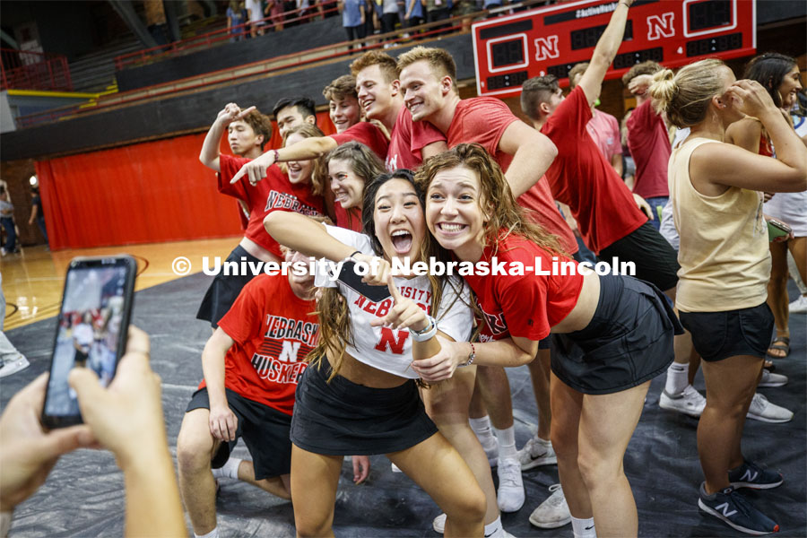 Triad 8--Sigma Chi, Chi Omega, Alpha Chi Omega, Alpha Gamma Sigma, Lambda Phi Epsilon--celebrates their winning on the Coliseum floor surrounded by fans.  Showtime at the Coliseum performances as part of Homecoming week. September 30, 2019. Photo by Craig Chandler / University Communication.