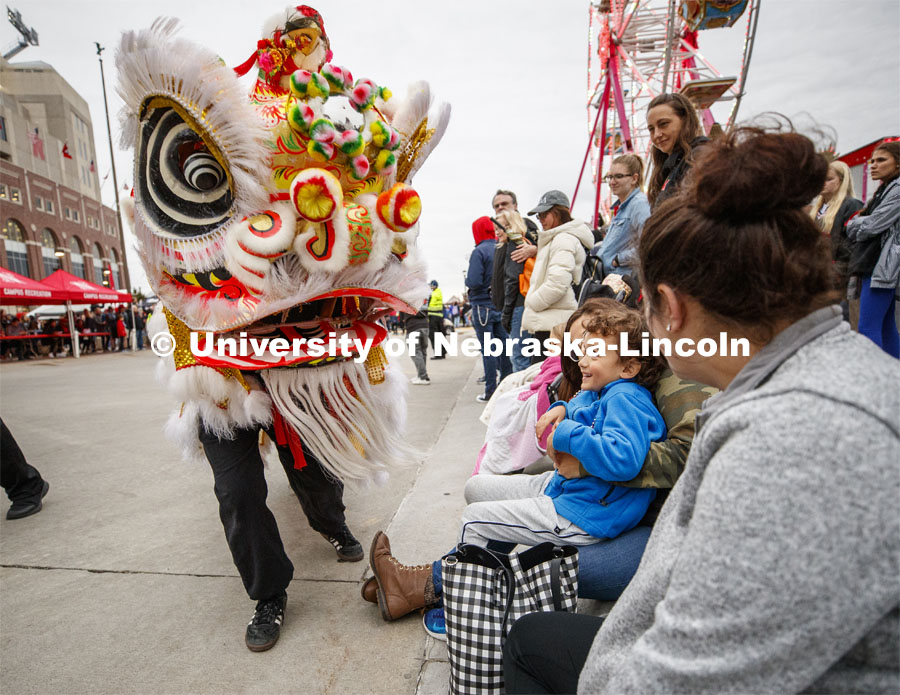 The Chinese dragons entertain the crowd. Cornstock celebration and Homecoming Parade. October 4, 2019. Photo by Craig Chandler / University Communication.
