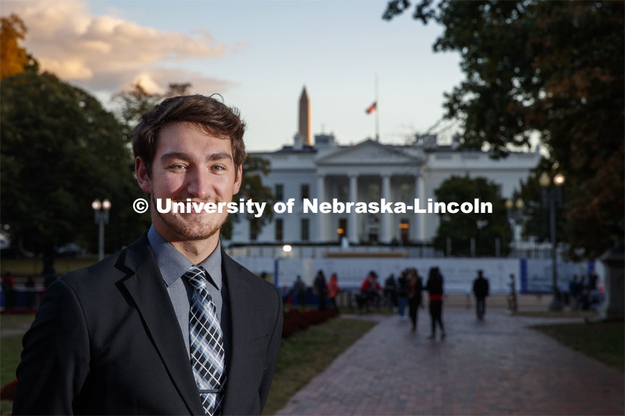 Ryan Bentz, Junior in Political Science major, outside the White House and the Eisenhower Executive Office Building where he works in Washington D.C.  October 17, 2019. Photo by Craig Chandler / University Communication.