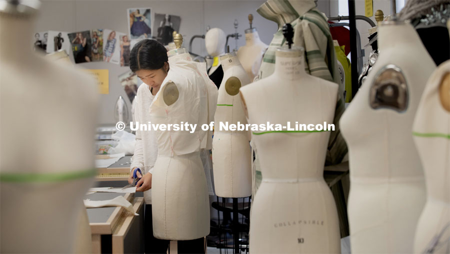 Adrianna Vang, a Junior in the Textile and Apparel Design Class, from Omaha works on a bodice muslin in her Flat Pattern class. Textiles, Merchandising and Fashion Design photo shoot. October 23, 2019. Photo by Gregory Nathan / University Communication.