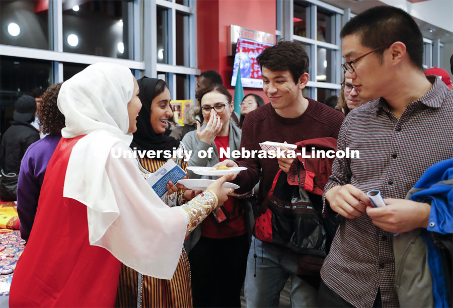 The lines were long and deep to sample cultural food at the various booths. Global Huskers Festival, a multicultural festival provides attendees the chance to explore the world through informational booths that will have food, cultural décor, art, and more, each hosted by UNL students from those culture. November 19, 2019. Photo by Craig Chandler / University Communication.