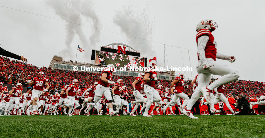 The Husker football team running onto the field at the Nebraska vs. Iowa State University football game. November 29, 2019. Photo by Justin Mohling / University Communication.