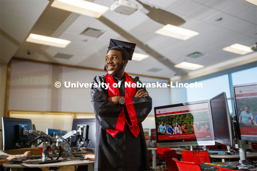 Quincey Bernard, an international business student graduating this December, plans to use what he's learned at Nebraska over the last three years to give back to his home country of Haiti. Quincey is pictured inside Hawks Hall. December 6, 2019. Photo by Craig Chandler / University Communication.