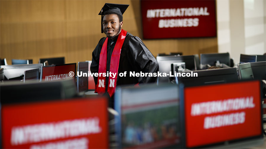 Quincey Bernard, an international business student graduating this December, plans to use what he's learned at Nebraska over the last three years to give back to his home country of Haiti. Quincey is pictured inside Hawks Hall. December 6, 2019. Photo by Craig Chandler / University Communication.