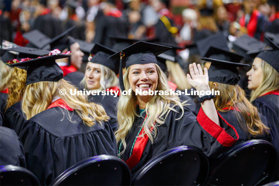 Kaylee Easter waves to family and friends. December Undergraduate commencement at Pinnacle Bank Arena. December 21, 2019. Photo by Craig Chandler / University Communication.