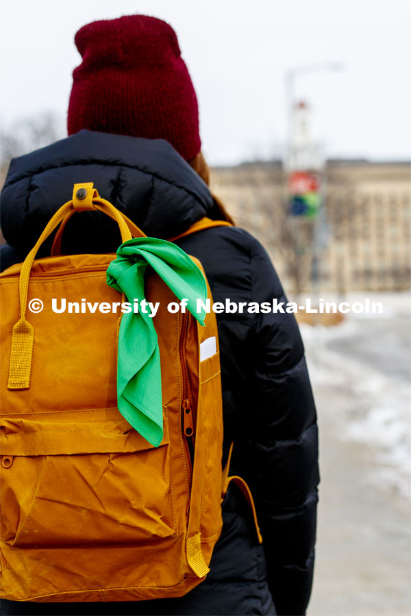 A new campaign, the Bandana Project, will launch at the University of Nebraska—Lincoln to provoke conversations about mental health and promote resources available to help students. Camille Paddock wears a green bandana on her backpack to show support for mental health awareness. The Bandana Project is a program designed to spread awareness of resources for those with mental illness. Green bandanas are attached to students’ backpacks. This indicates that they are a safe individual to approach with mental health-related issues, that they know where resources are, and that they hold a few resource cards. January 21, 2020. Photo by Craig Chandler / University Communication.