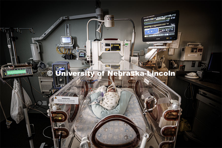Erica Ryherd looks in on Ah'Mel, a patient at Nebraska Med’s Newborn Intensive Care Unit. Ah'Mel was born November 29, 2019 with a birth weight of 1.68 pounds. Ryherd, an Associate Professor in The Durham School of Architectural Engineering and Construction, is making neonatal intensive care units better for their young patients. She specializes in noise control, architectural acoustics, environmental noise, and human response to the built environment. January 23, 2020. Photo by Craig Chandler / University Communication.