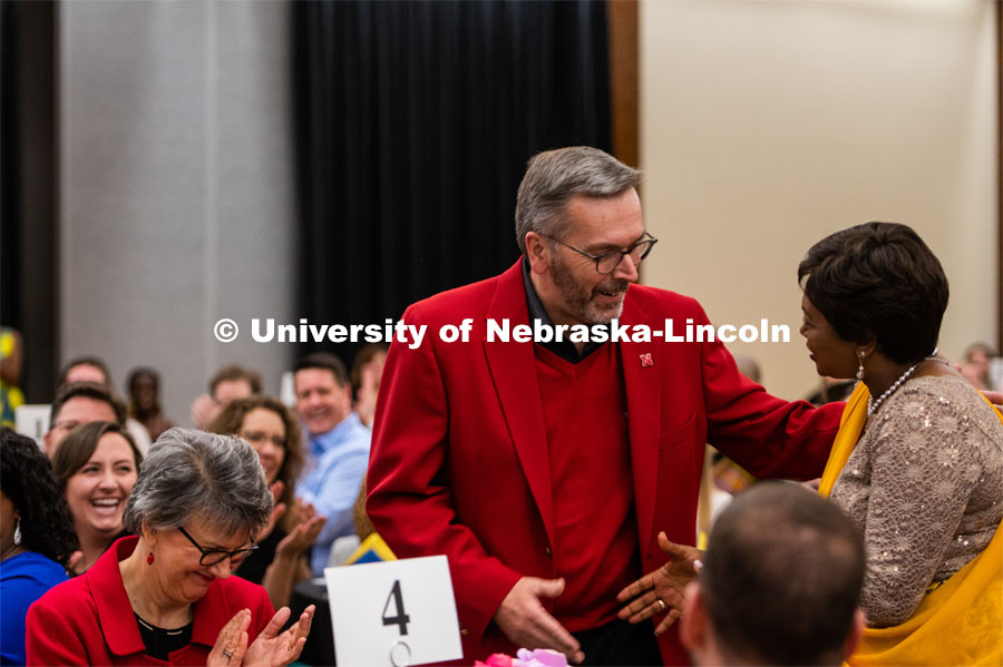 Chancellor Ronnie Green shakes hands with Ambassador Mathilde Mukantabana at the University of Nebraska–Lincoln's Rwanda Night celebration in the Nebraska Union's Centennial Room. The annual event feature Rwandan-inspired cuisine, dancing and traditional music. February 1, 2020. Photo by Justin Mohling / University Communication.