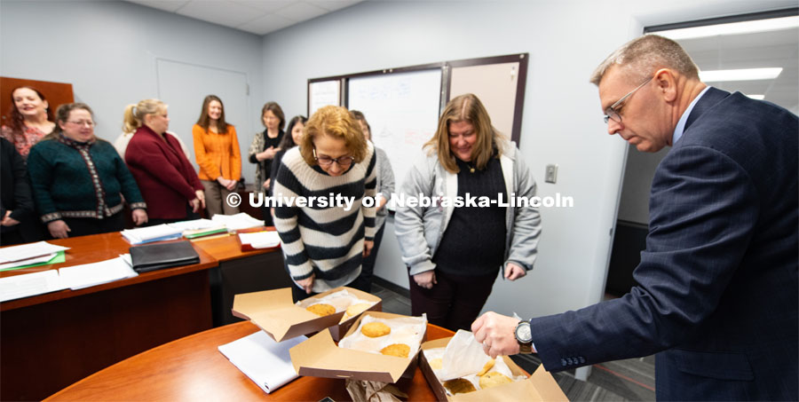 A job well done, Chancellor Ronnie Green give cookies to the Payroll and Travel staff for their hard work. February 4, 2020. Photo by Gregory Nathan / University Communication.