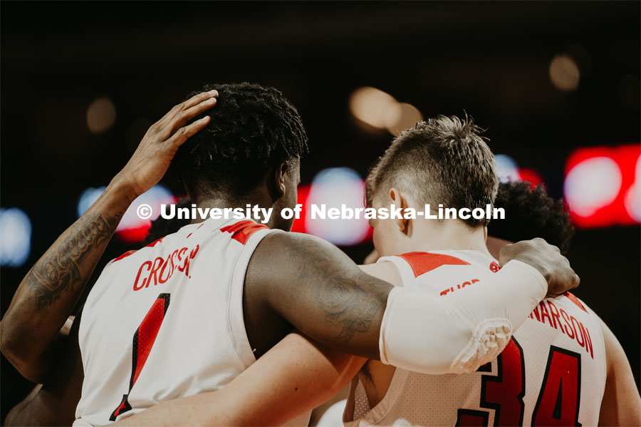 The team huddles during a time-out. Nebraska vs. Wisconsin State University men’s basketball game. February 15, 2020. Photo by Justin Mohling / University Communication.